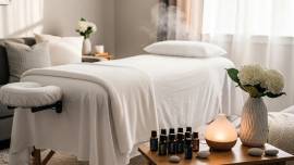 Mobile postnatal massage setup in a cozy living room with a portable table and calming decor